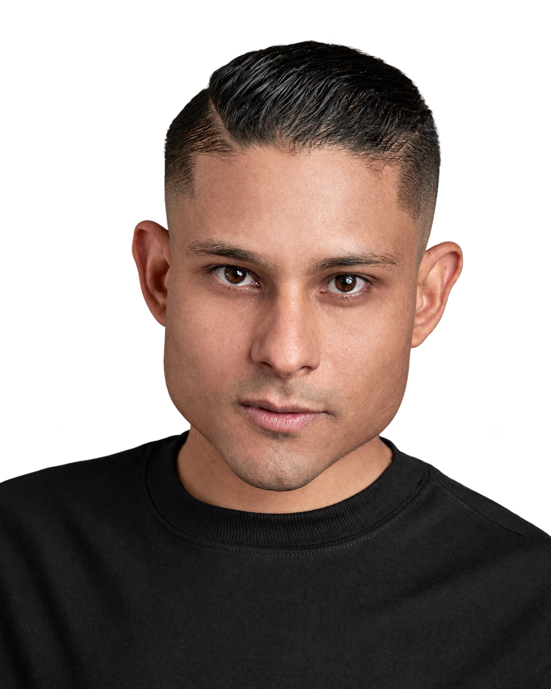 Close-up of Bruno Stephen in a black T-shirt, looking at the camera